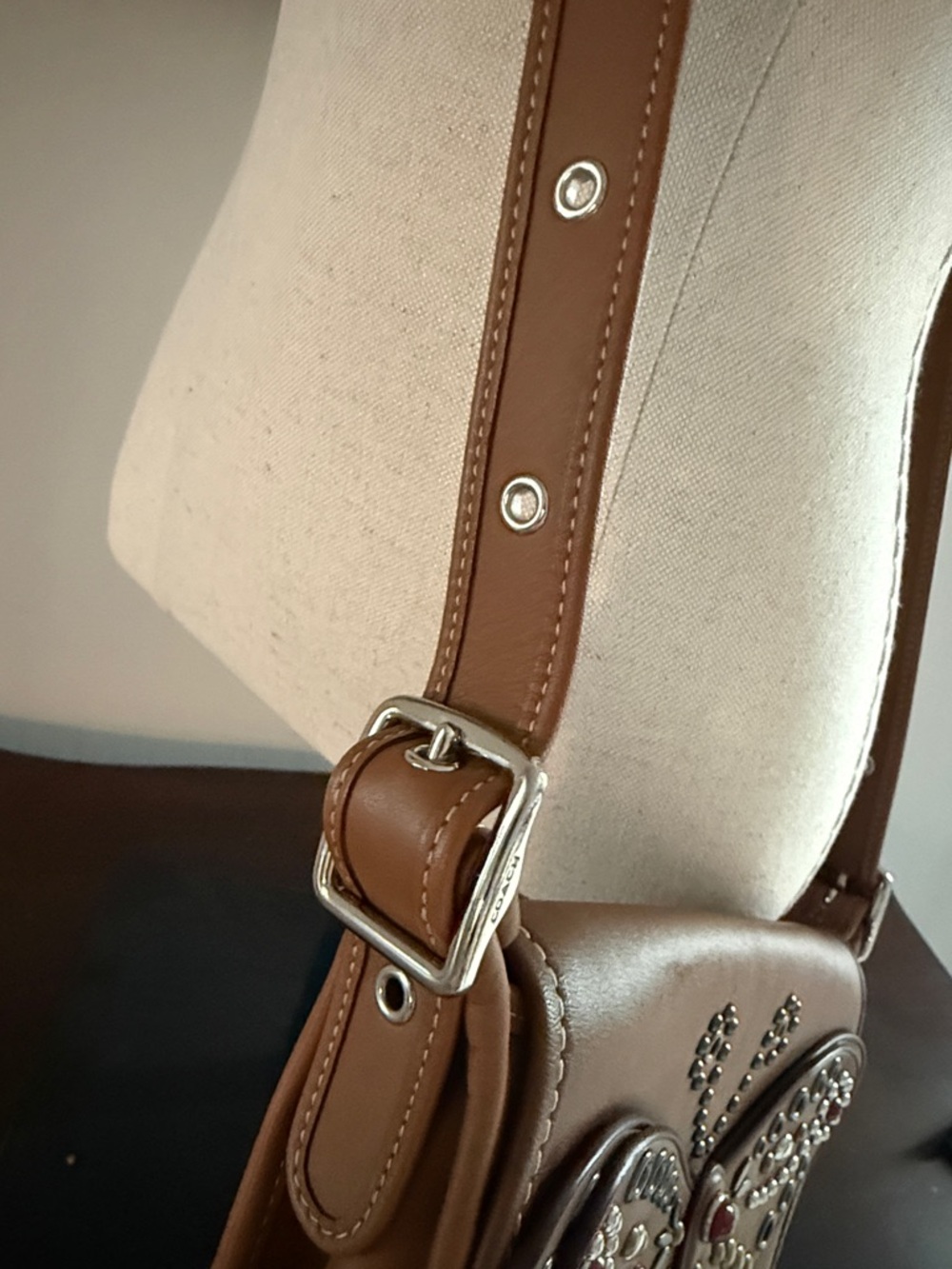 COACH Saddle Bag with Embellished Butterfly - Picture 7 of 9